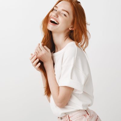 carefree-happy-redhead-woman-laughing-smiling-enjoying-summer 2
