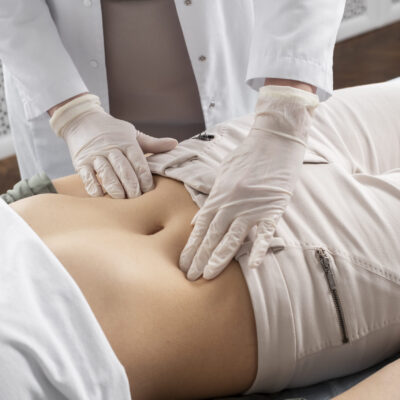 high-angle-doctor-checking-patient