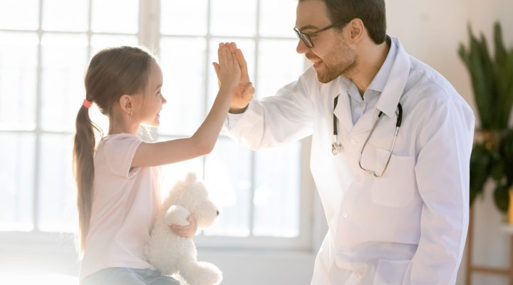 Caring,Happy,Young,Caucasian,Doctor,In,White,Uniform,Have,Fun